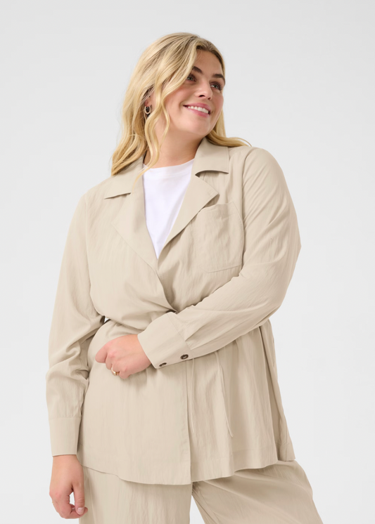 Beige skjorte med knyting