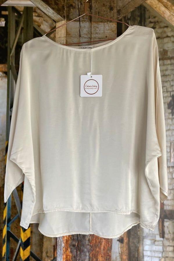 Hvit genser med båthals og lange ermer