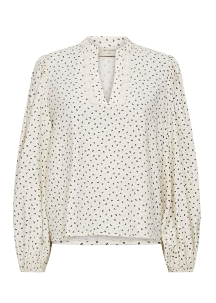 Bluse med lange ermer og prikker