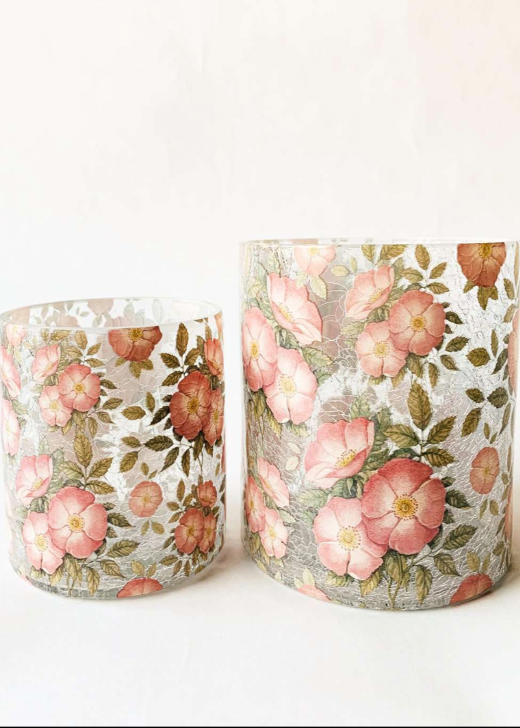 Dekorativt lysglass med blomster