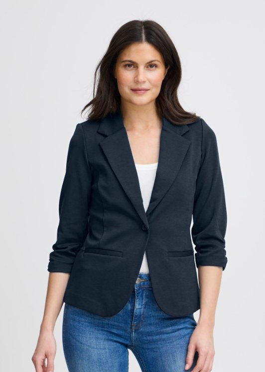 Blå blazer