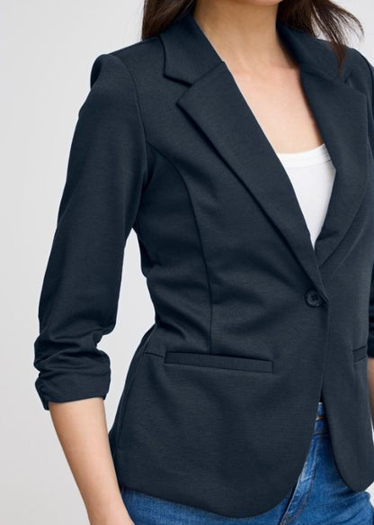 Blå blazer