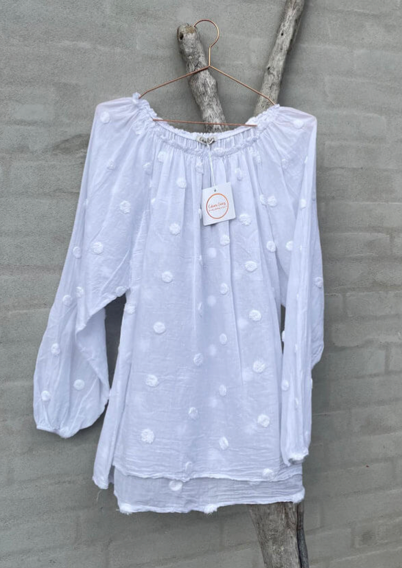 Off-shoulder bluse med broderte prikker