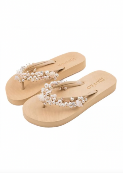 Beige flip flops