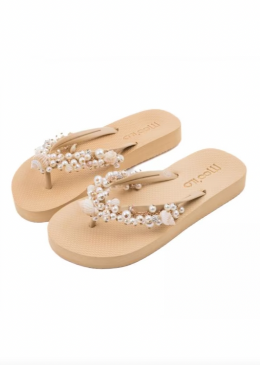 Beige flip flops